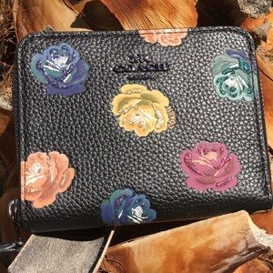 Coach sparkling flower covered wallet 🌸🌺